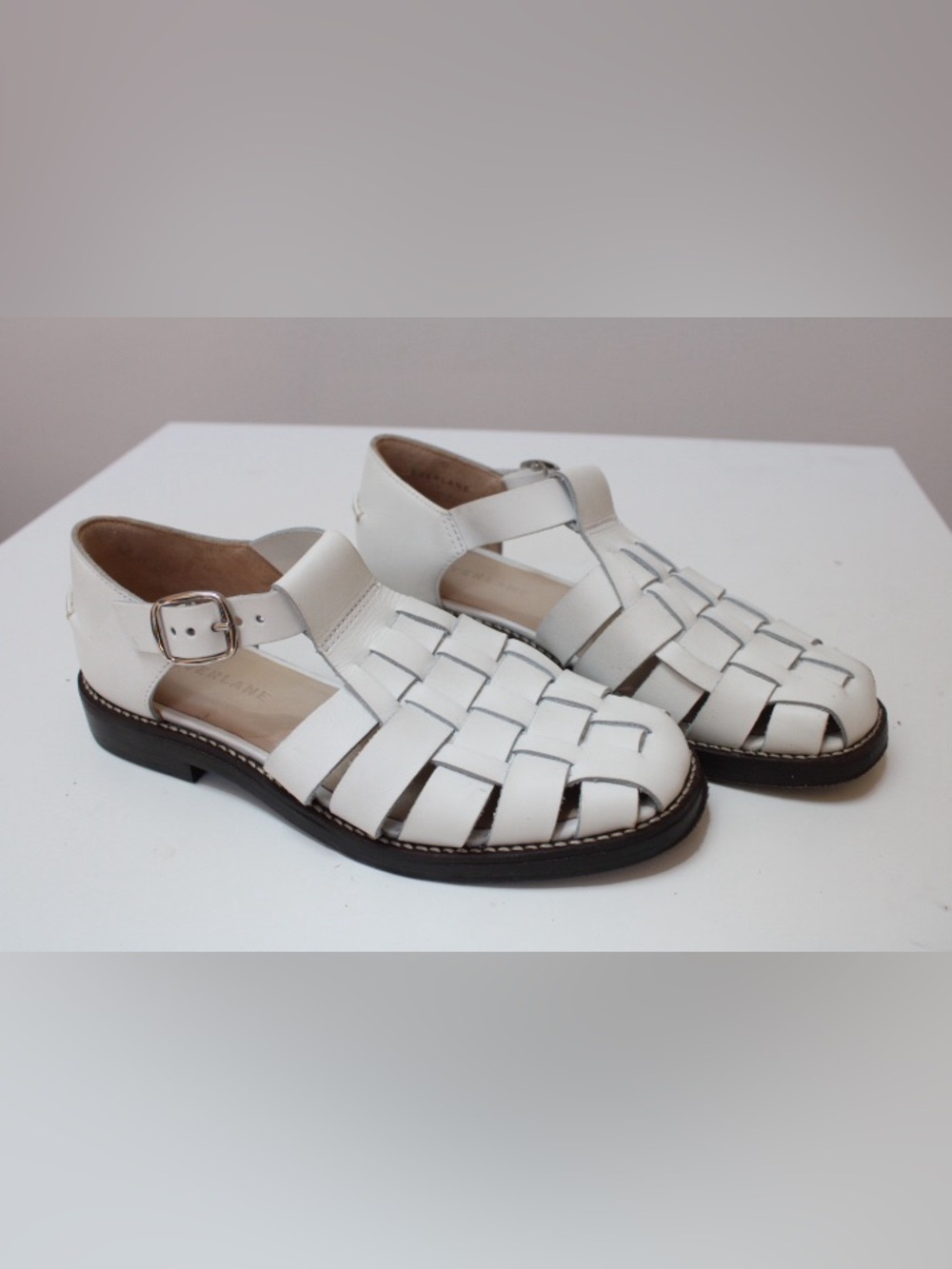 Everlane white fisherman sandals.